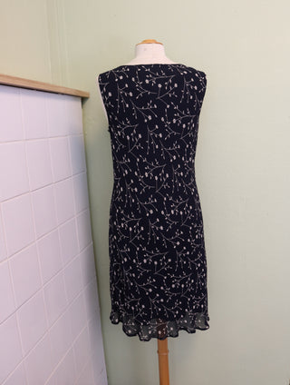 Navy jurk waterval hals - Maat M/L