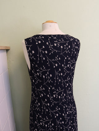 Navy jurk waterval hals - Maat M/L