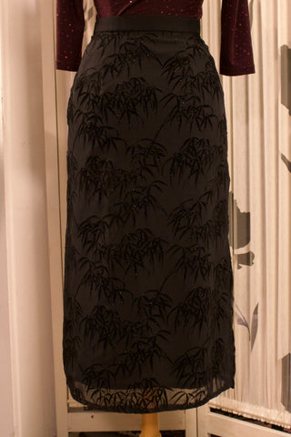 Zwarte rok met glitter print - Maat L