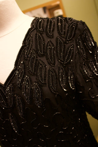 Zwarte zijde top met kralen - Maat S